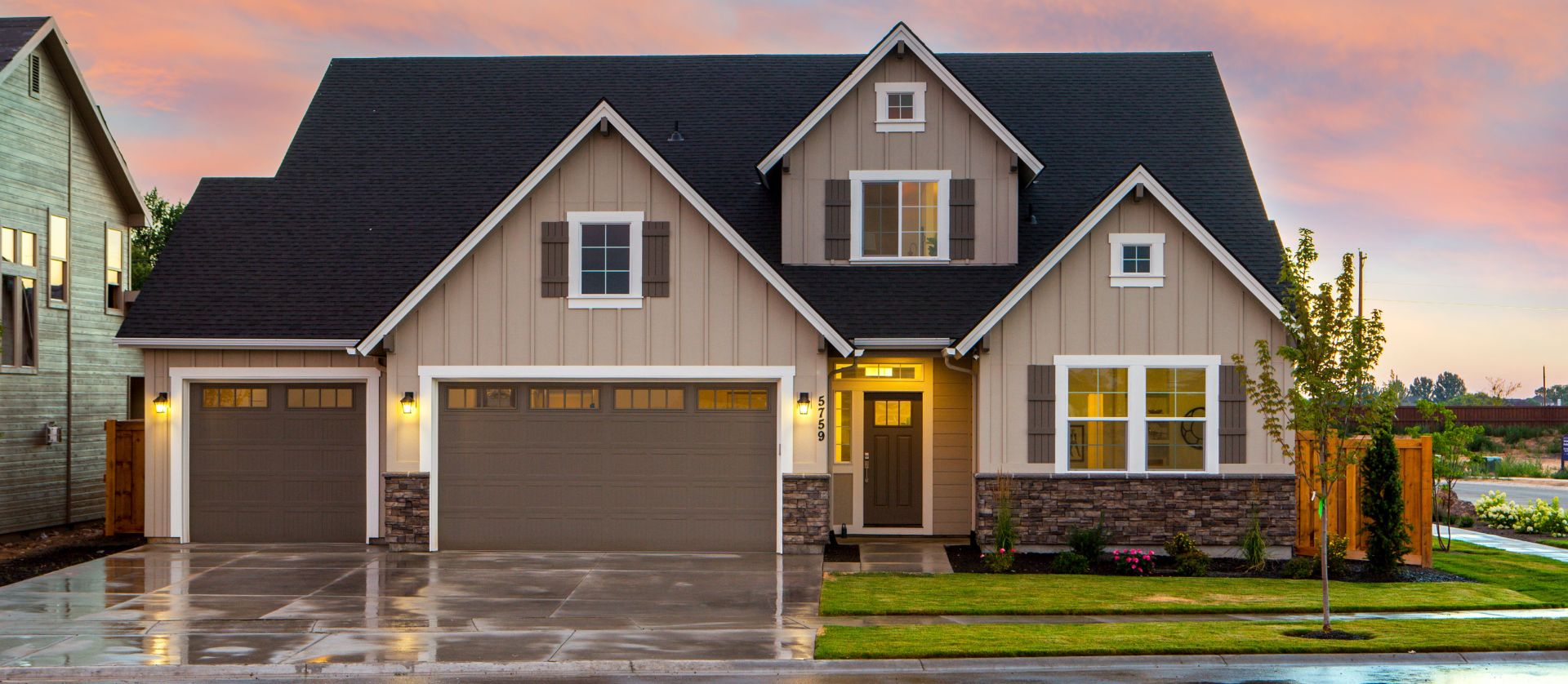 Brown and Gray Painted House in Front of Road